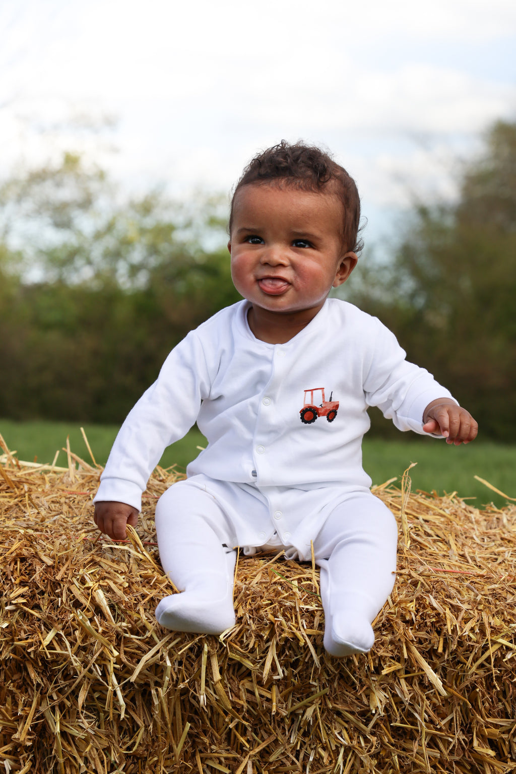Red tractor sleepsuit