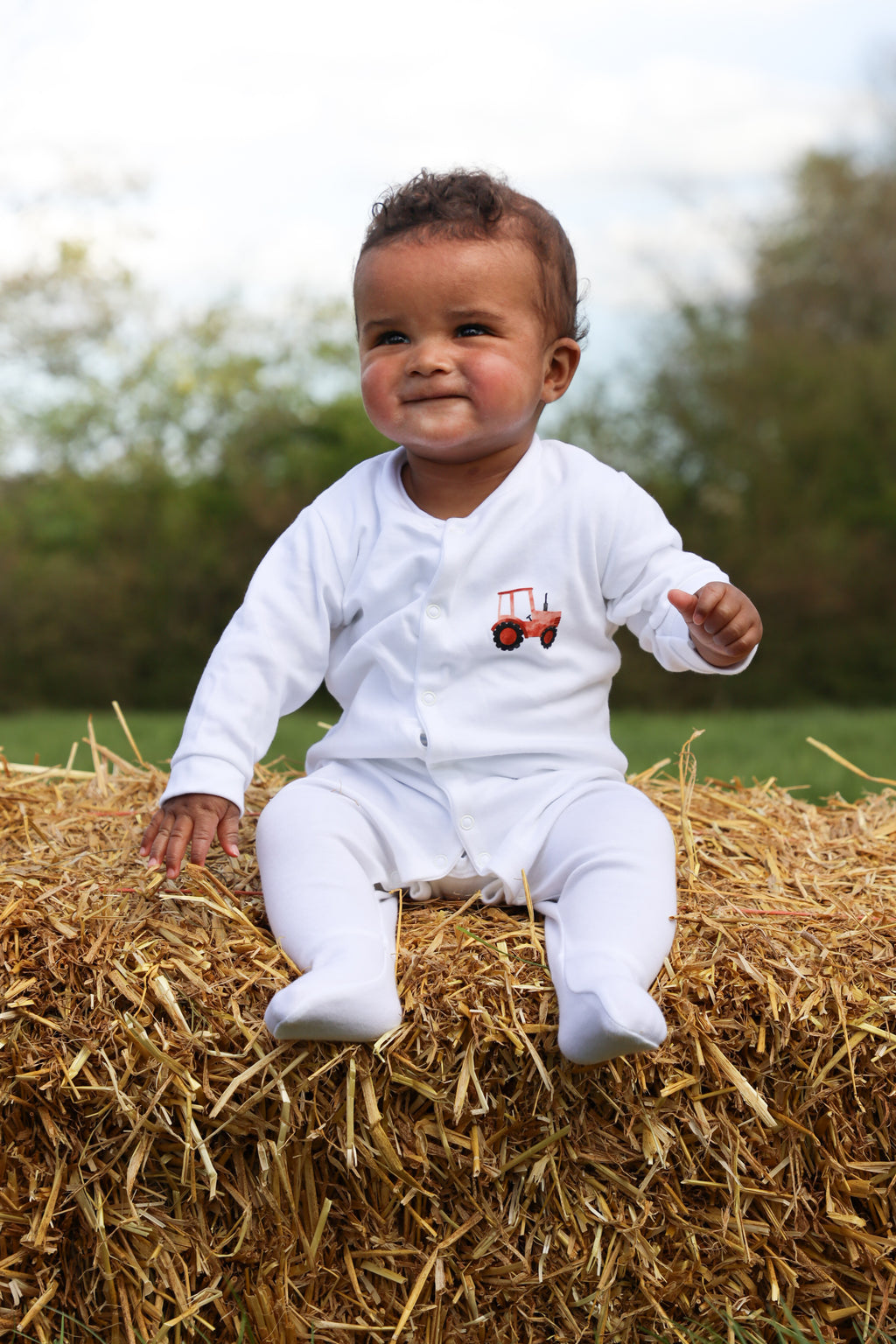 Red tractor sleepsuit