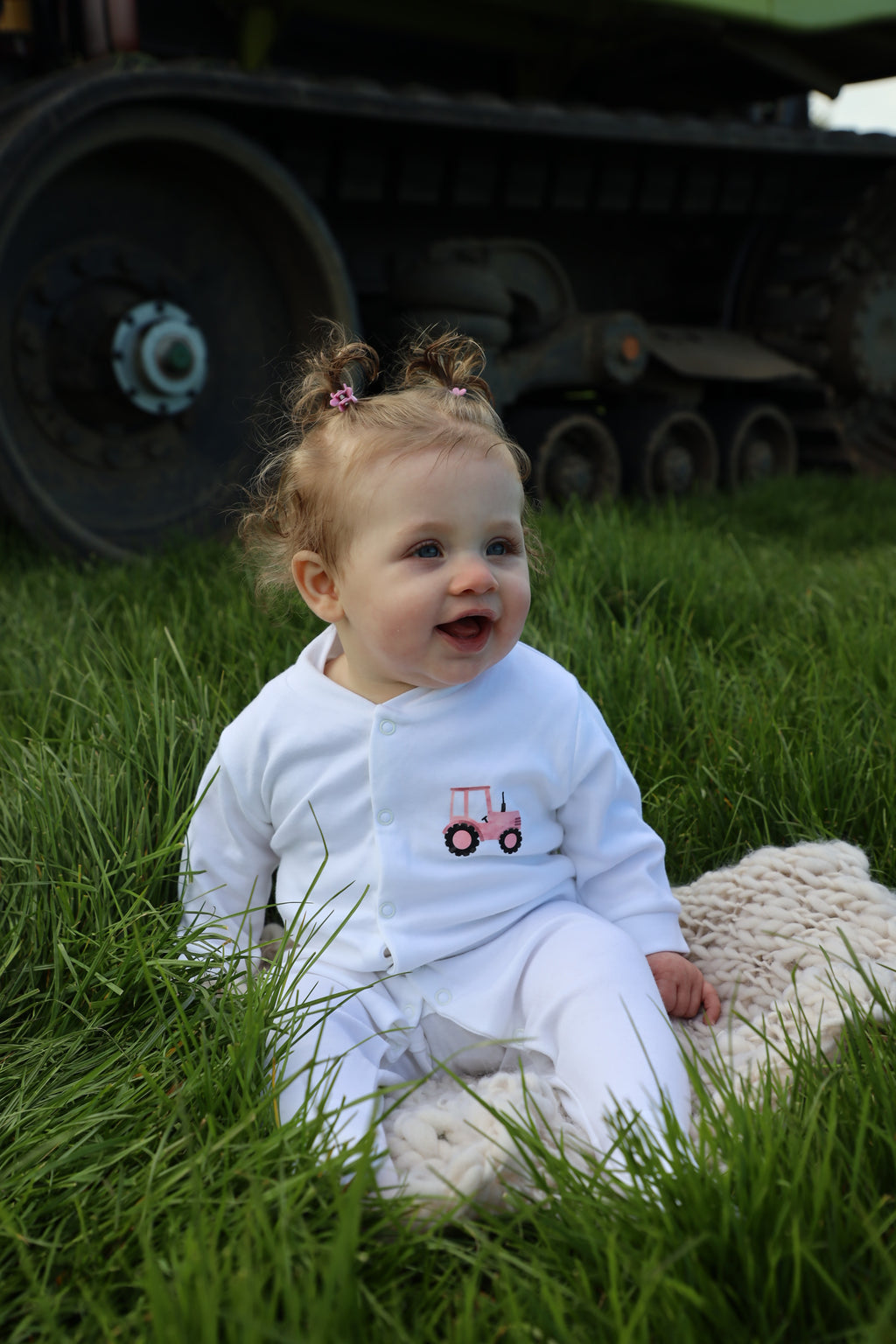 Pink tractor sleepsuit