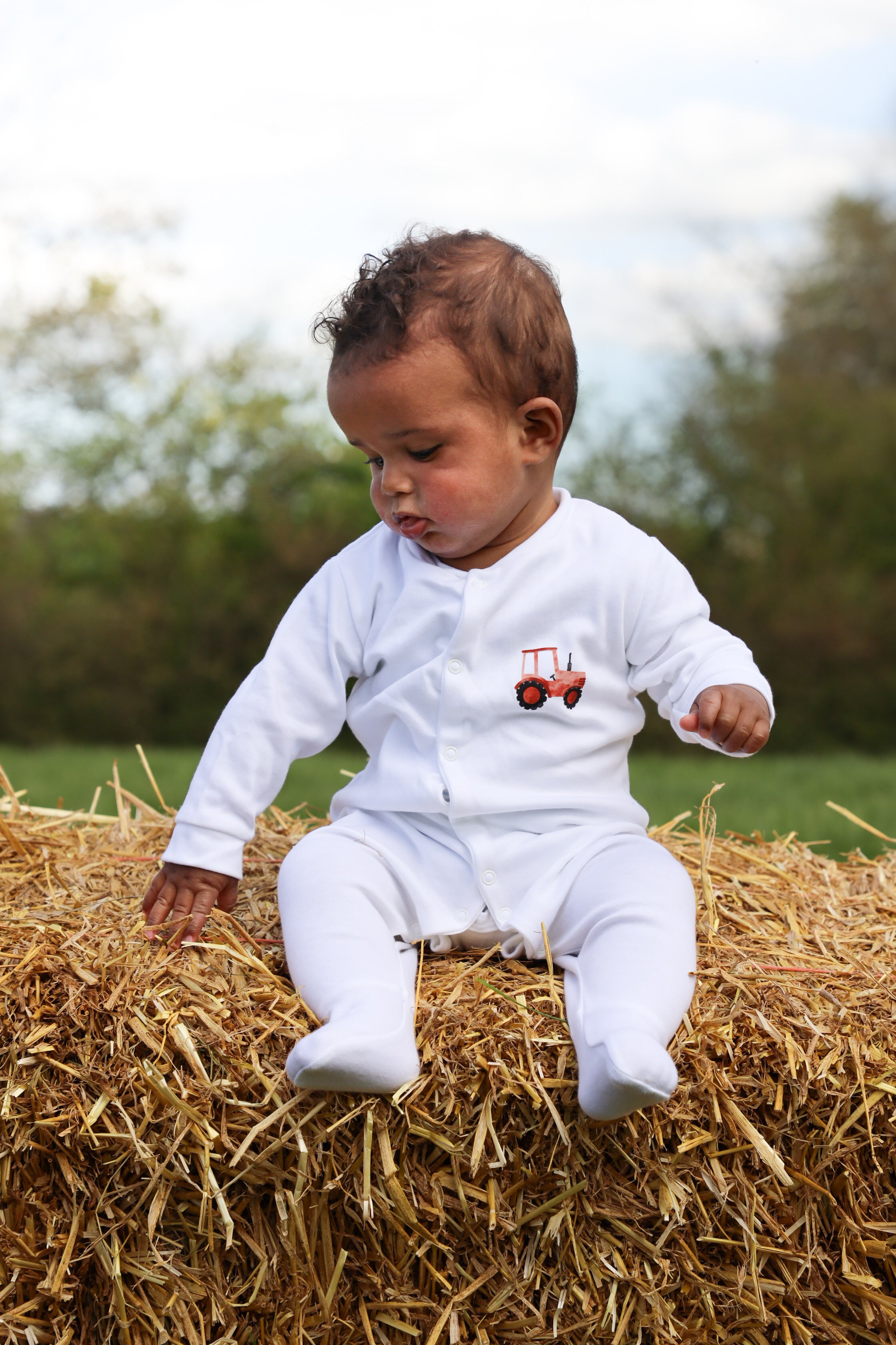 Red tractor sleepsuit