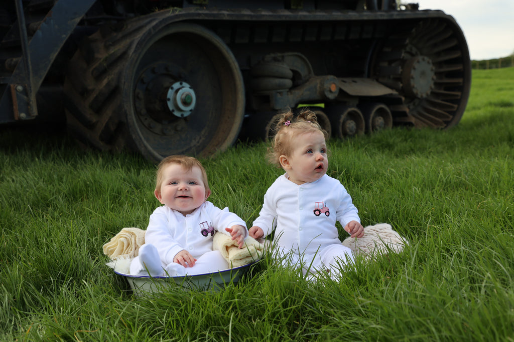 Purple tractor sleepsuit